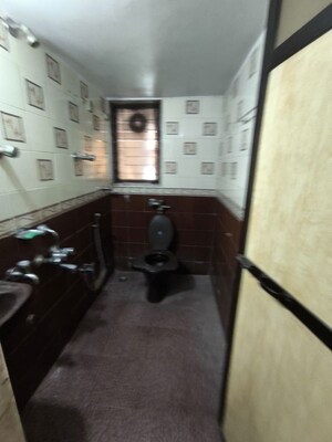 Washroom in 2 BHK Apartment at Mahavir Arcade, Naupada – for Rent
