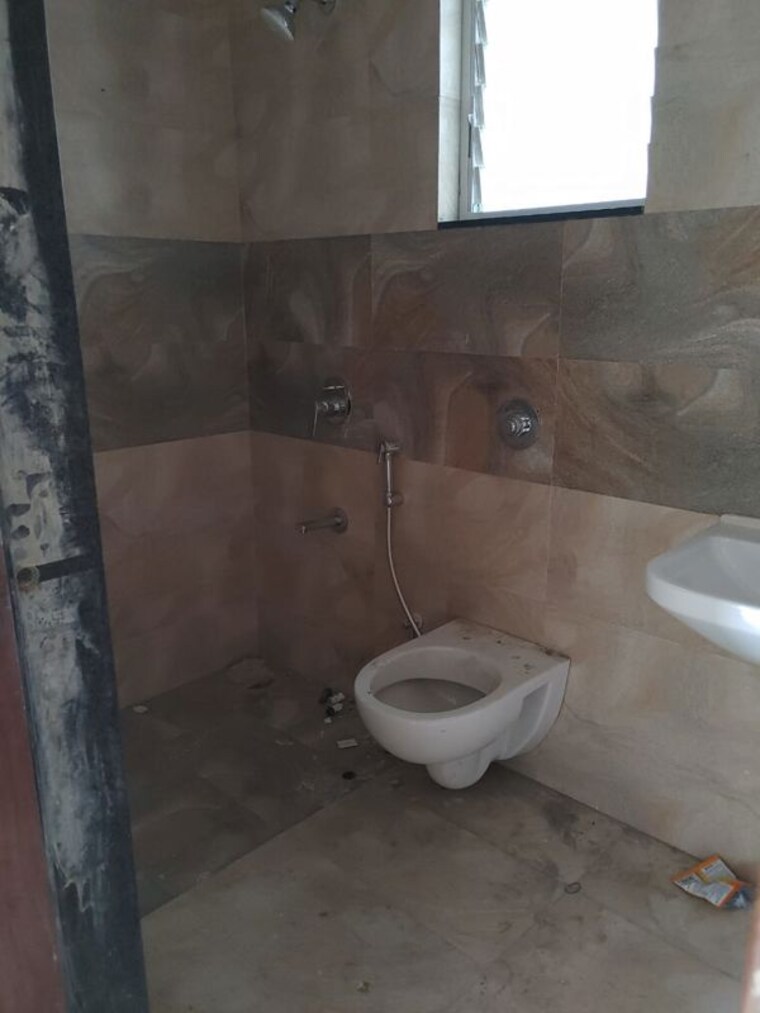 Bathroom, pinnacle-neelanchal 2 Bedroom 800 Sq.Ft. Apartment In Baner Pune 10453388