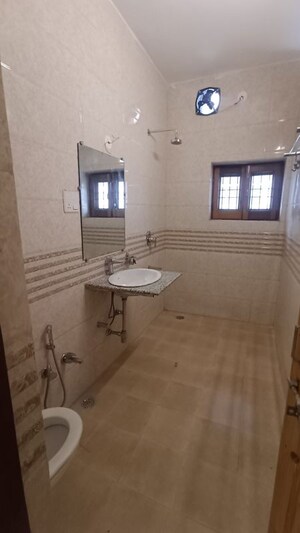 Bathroom in 4 BHK Builder Floor at Mithapur – for Rent