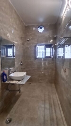 Bathroom in 4 BHK Builder Floor at Mithapur – for Rent