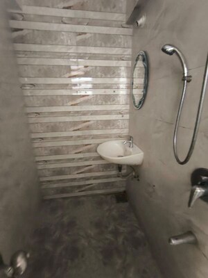 Bathroom in 2 BHK Apartment at Naupada – for Rent