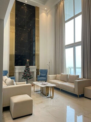 Living Room in 4 BHK Apartment at Mahagun Mezzaria, Sector 78 – for Sale