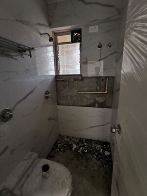 Bathroom in 2 BHK Apartment at Yash Satyaneelayam CHS, Naupada – for Rent