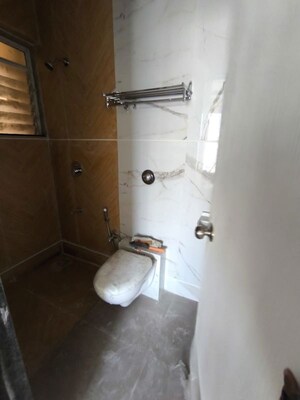 Bathroom in 2 BHK Apartment at Yash Satyaneelayam CHS, Naupada – for Rent