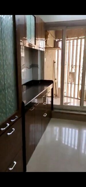 Kitchen in 2 BHK Apartment at Anmol Towers, Goregaon West – for Rent