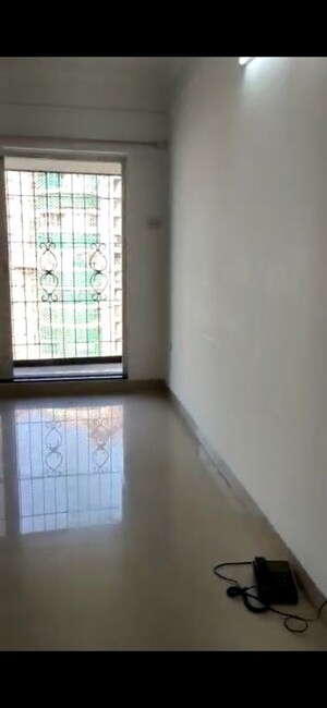 Room in 2 BHK Apartment at Anmol Towers, Goregaon West – for Rent