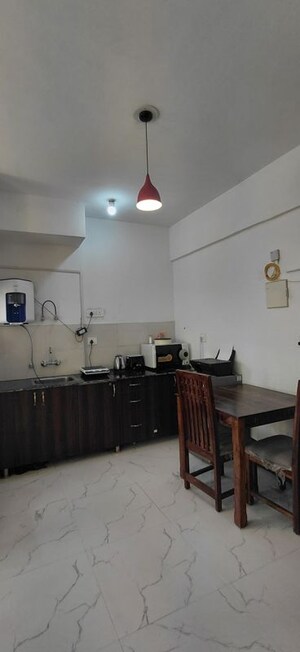 Kitchen in Studio Apartment at Earthcon Casa Grande II, Chi V Greater Noida – for Rent