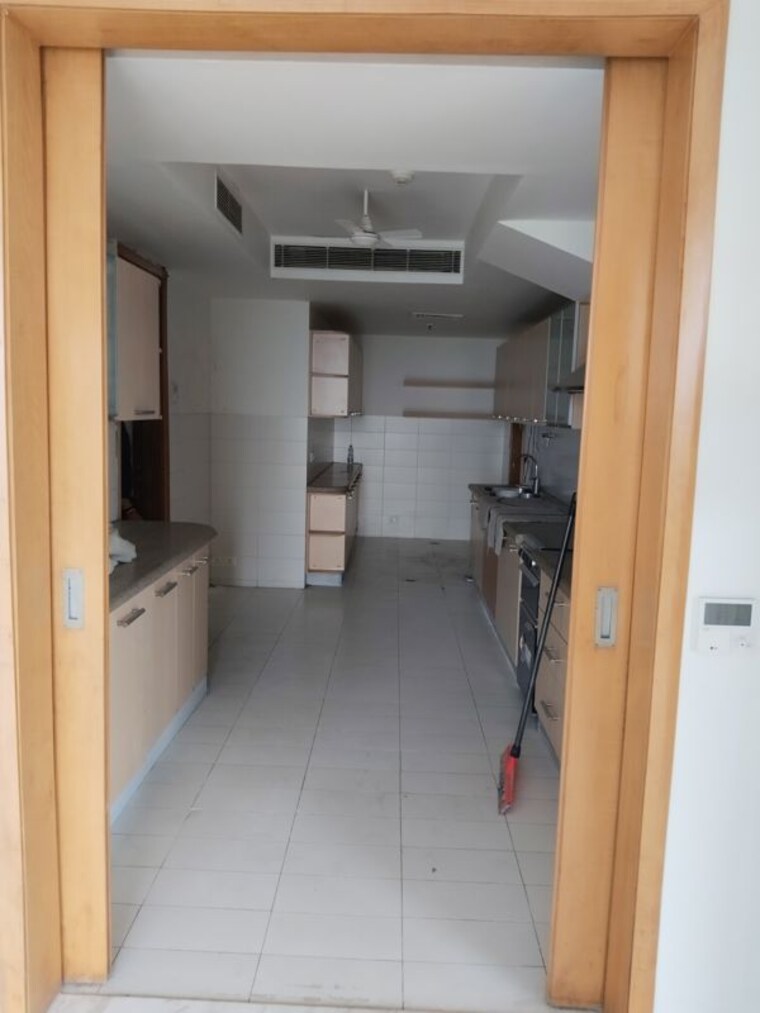 Kitchen, jaypee-green-sun-court-tower-iii 3 Bedroom 3840 Sq.Ft. Apartment In Jaypee Greens Greater Noida 10453623