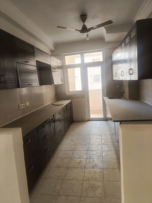 Kitchen in 4 BHK Apartment at Amrapali Silicon City, Sector 76 – for Rent
