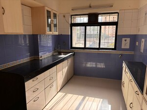 Kitchen in 2 BHK Apartment at Lalani Grandeur, Goregaon East – for Rent