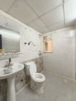 Bathroom in 3 BHK Apartment at Amrapali Silicon City, Sector 76 – for Rent
