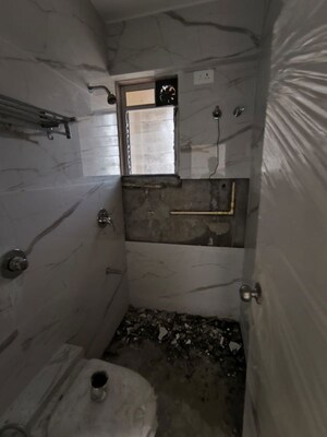 Bathroom in 2 BHK Apartment at Yash Satyaneelayam CHS, Naupada – for Rent