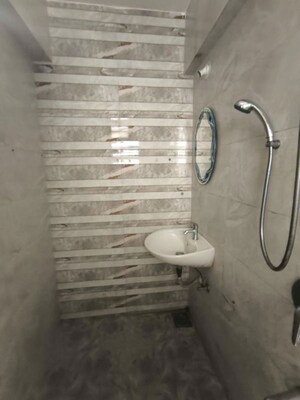 Bathroom in 2 BHK Apartment at Yash Satyaneelayam CHS, Naupada – for Rent
