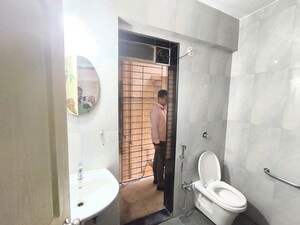 Bathroom in 2 BHK Apartment at Yash Satyaneelayam CHS, Naupada – for Rent