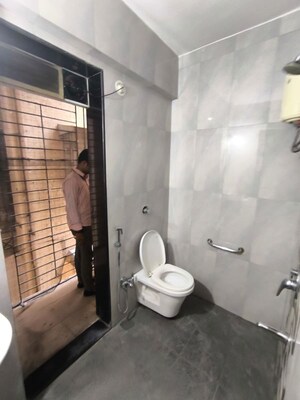 Bathroom in 2 BHK Apartment at Yash Satyaneelayam CHS, Naupada – for Rent