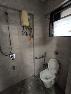Bathroom in 2 BHK Apartment at Yash Satyaneelayam CHS, Naupada – for Rent