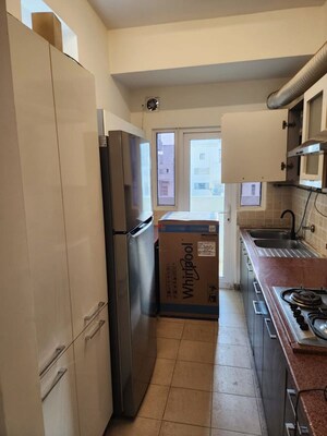Kitchen in 2.5 BHK Apartment at Mahagun Moderne, Sector 78 – for Rent