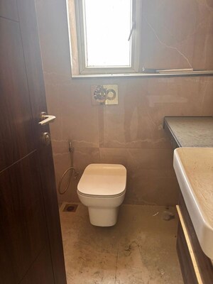 Bathroom in 2 BHK Apartment at Smart World Orchard, Sector 61 – for Rent