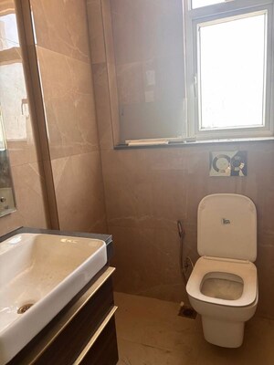 Bathroom in 2 BHK Apartment at Smart World Orchard, Sector 61 – for Rent