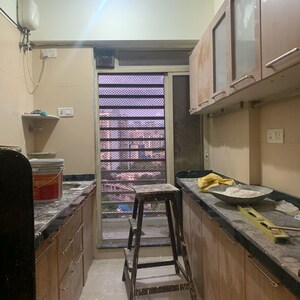 Kitchen in 1 BHK Apartment at The Wadhwa Parwana Tower, Saibaba Nagar – for Rent