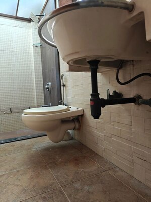 Bathroom in 2 BHK Apartment at Lokhandwala Complex – for Rent