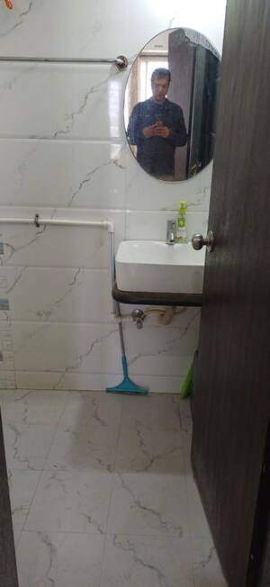 Bathroom in 1 BHK Apartment at Satyam Rajyog, Dhanori – for Rent