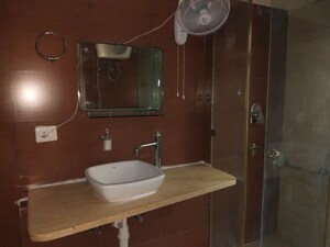 Bathroom in 2.5 BHK Apartment at Mahagun Moderne, Sector 78 – for Rent