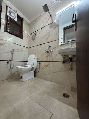 Bathroom in 2 BHK Apartment at Chattarpur – for Rent