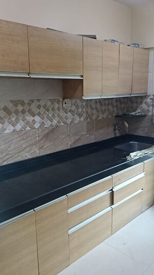 Kitchen in 2 BHK Apartment at Vile Parle West – for Rent