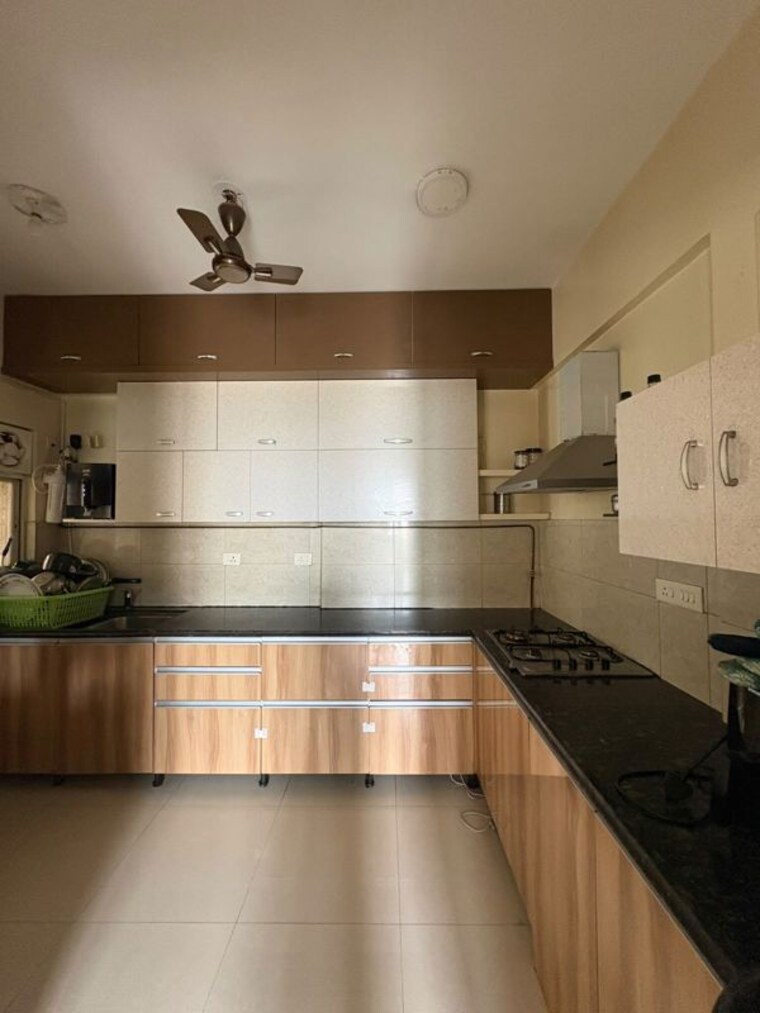 Kitchen, gera-song-of-joy 2 Bedroom 870 Sq.Ft. Apartment In Kharadi Pune 10454191