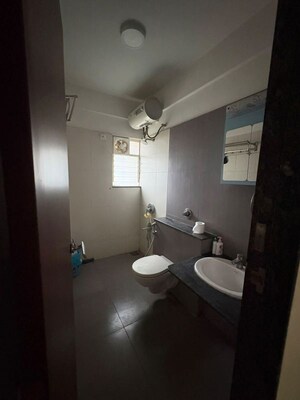 Bathroom in 2 BHK Apartment at Gera Song Of Joy, Kharadi – for Rent