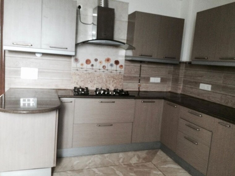 Kitchen, lavish-apartment 3 Bedroom 8000 Sq.Ft. Builder Floor In Malcha Marg Delhi 10454282
