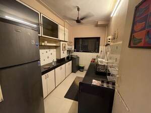 Kitchen in 2 BHK Apartment at Gulshan Apartment Andheri, Andheri West – for Rent