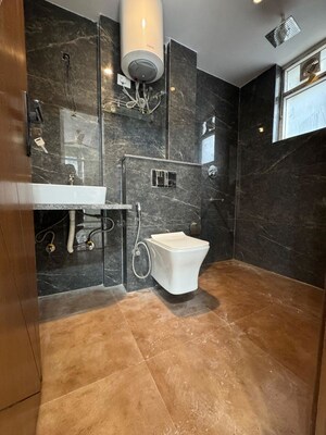 Bathroom in 3 BHK Apartment at Chattarpur – for Rent