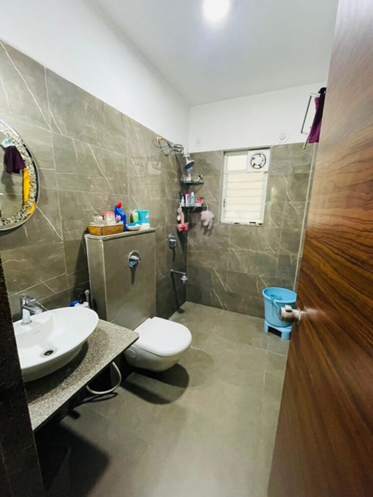 Washroom, royal-imperio 2 Bedroom 1250 Sq.Ft. Apartment In Pimple Saudagar Pune 10454388
