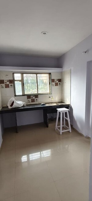 Kitchen in 1 BHK Apartment at Wadgaon Sheri – for Sale