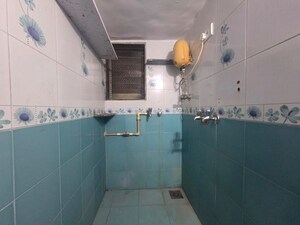 Bathroom in 3 BHK Apartment at Topiwala CHS, Goregaon West – for Sale