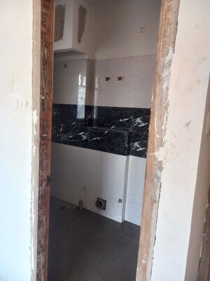 Kitchen in 3 BHK Apartment at Natural City Laketown, Lake Town – for Rent