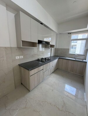 Kitchen in 2 BHK Apartment at Smart World Orchard, Sector 61 – for Rent