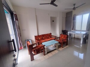 Living Room in 1 BHK Apartment at Krishna Lotus Court, Kharadi – for Rent