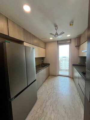 Kitchen in 3.5 BHK Apartment at Ambience Tivertone, Sector 50 – for Rent