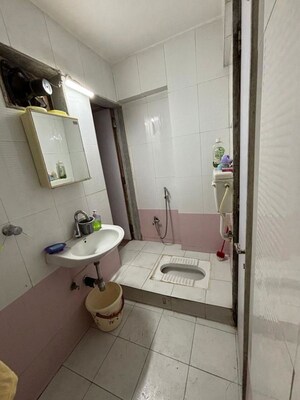 Bathroom in 1 BHK Apartment at SSB Ashok Nagar, Balkum Pada – for Sale