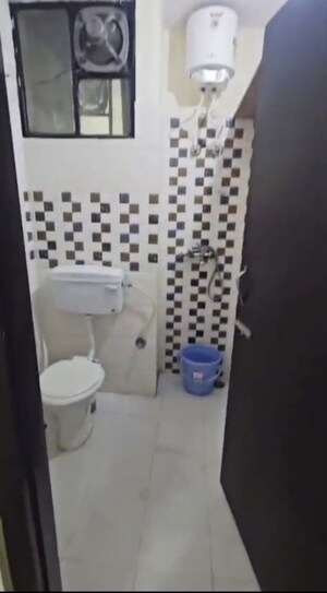 Bathroom in 2 BHK Apartment at Raja Park – for Sale