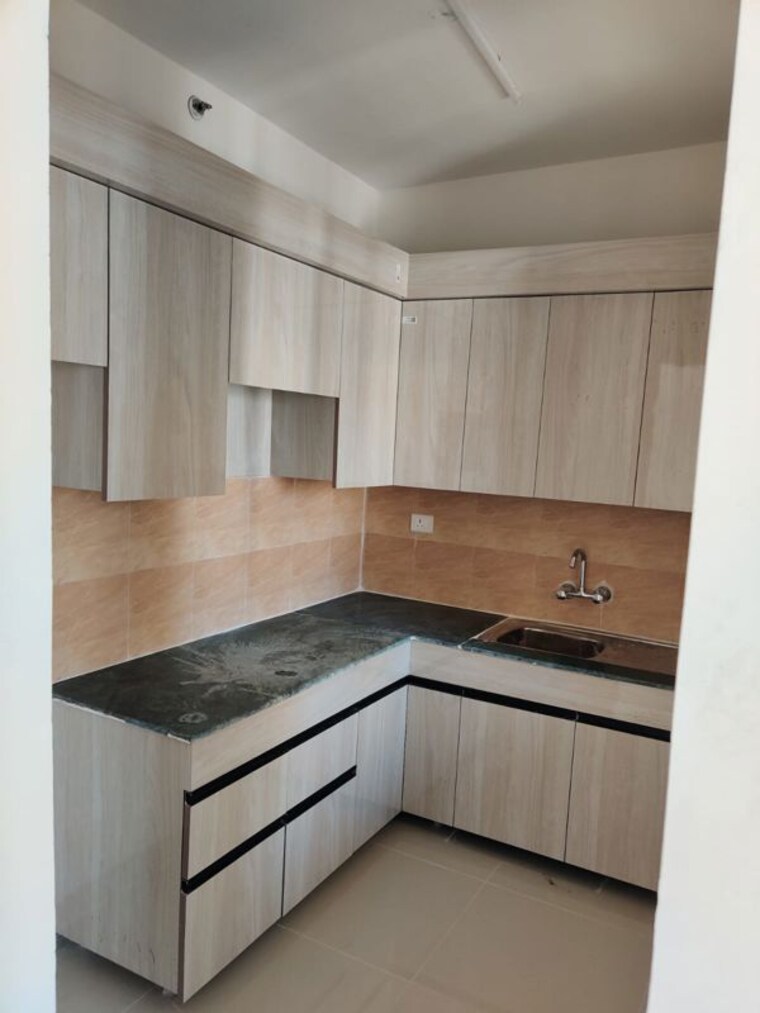 Kitchen, jaypee-green-kosmos-phase-ii 2 Bedroom 960 Sq.Ft. Apartment In Sector 134 Noida 10454681