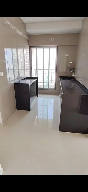 Kitchen in 2 BHK Apartment at Khodiyaar Siddharth Nagar Goodwill CHS, Goregaon West – for Rent
