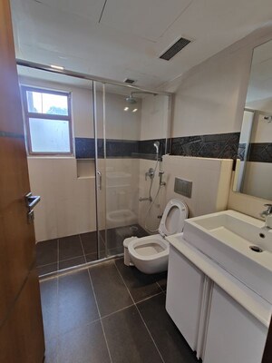 Washroom in 4 BHK Apartment at High Grounds – for Rent