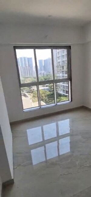 Bedroom in 2 BHK Apartment at Infinity Paradise CHS, Goregaon West – for Rent
