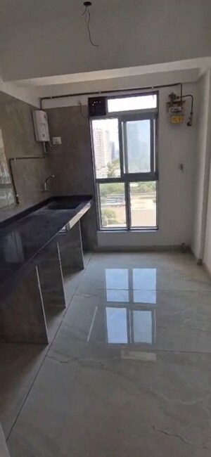 Kitchen in 2 BHK Apartment at Infinity Paradise CHS, Goregaon West – for Rent