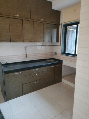 Kitchen in 3 BHK Apartment at Goyal Lakshchandi Heights, Goregaon East – for Rent