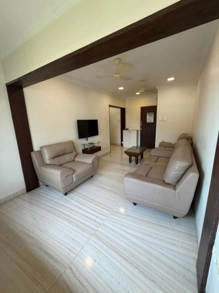 Living Room, pushpanjali-apartment-prabhadevi 2 Bedroom 850 Sq.Ft. Apartment In Prabhadevi Mumbai 10455093